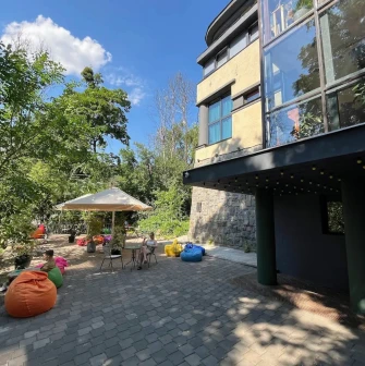 Generator - sunny outdoor terrace with a view and comfortable seating