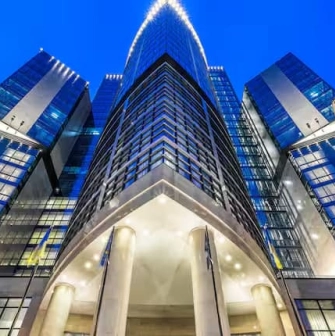 Facade of the Hilton Kyiv hotel in the evening