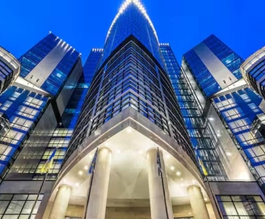 Facade of the Hilton Kyiv hotel in the evening