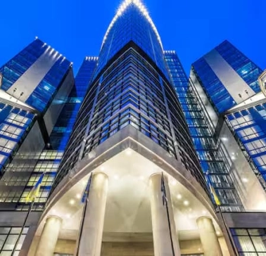Facade of the Hilton Kyiv hotel in the evening