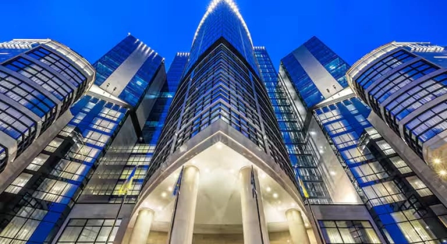 Facade of the Hilton Kyiv hotel in the evening