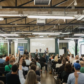 Generator - modern conference room set up with a main stage and screen