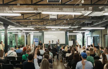 Generator - modern conference room set up with a main stage and screen