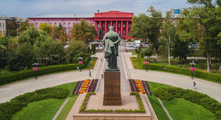 Monument to Taras Shevchenko and the red building of the university in Kyiv