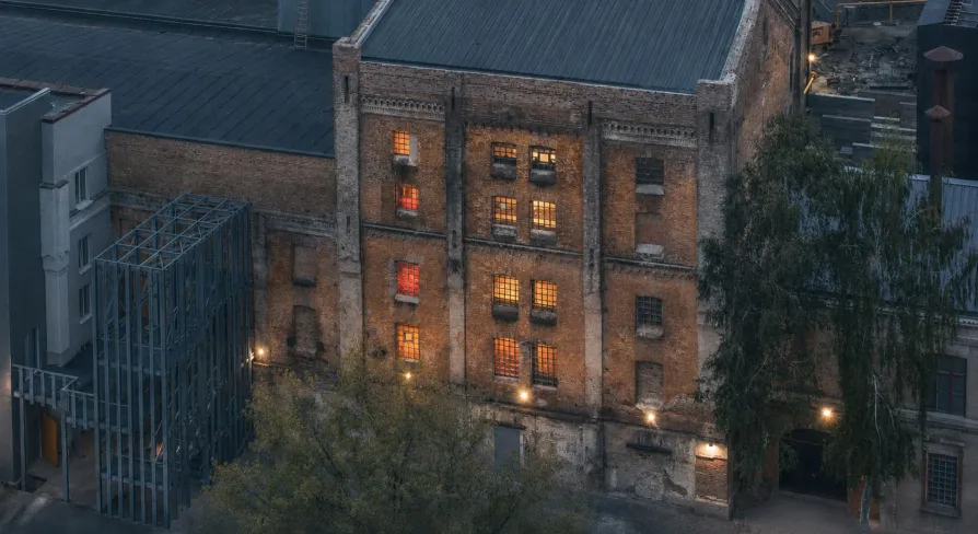 k41 - aerial view of the renovated historic brick industrial building complex and courtyard