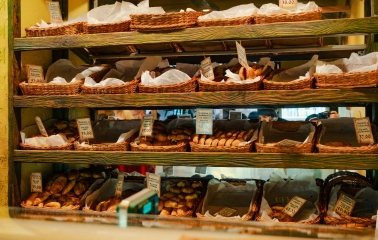Yaroslava pastry in Kyiv - shelves with freshly baked pies and pastries inside the bakery