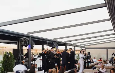 Live musical performance during an event at the "Veranda on the River" restaurant in Kyiv