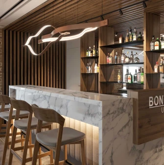 Bar counter and shelves with drinks in the Bontiak Hotel restaurant in Kyiv