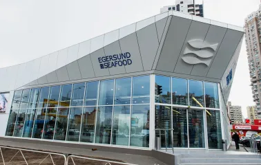 Egersund - storefront facade with signage and large glass windows