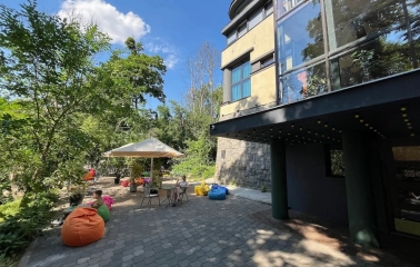 Generator - sunny outdoor terrace with a view and comfortable seating