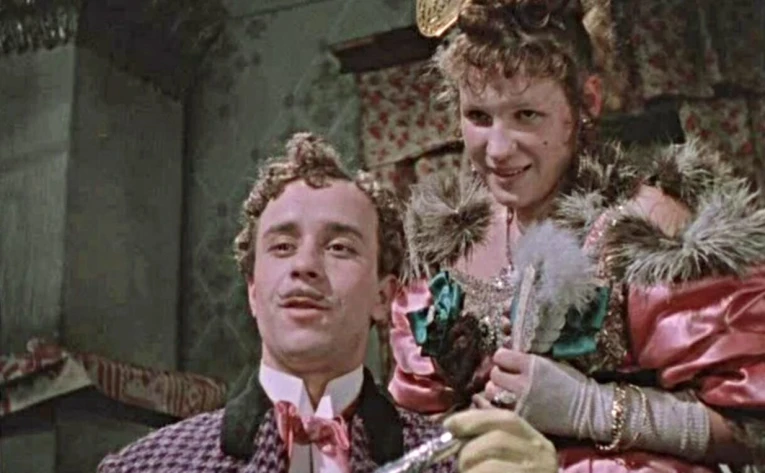 A scene from the Ukrainian classic “Chasing Two Hares”; a monument to the film’s main characters stands near St. Andrew’s Church.