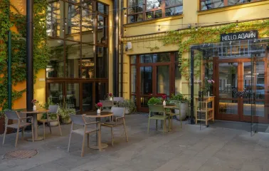 The courtyard of the Bursa Hotel in Kyiv with an outdoor terrace