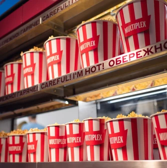 Popcorn in branded red and white buckets at the Multiplex cinema