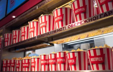 Popcorn in branded red and white buckets at the Multiplex cinema