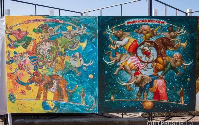 Visitors at KYIV ART FORT engaging in an interactive activity — creating a collective painting on a large canvas