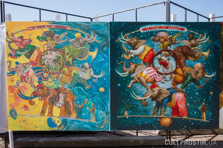 Visitors at KYIV ART FORT engaging in an interactive activity — creating a collective painting on a large canvas