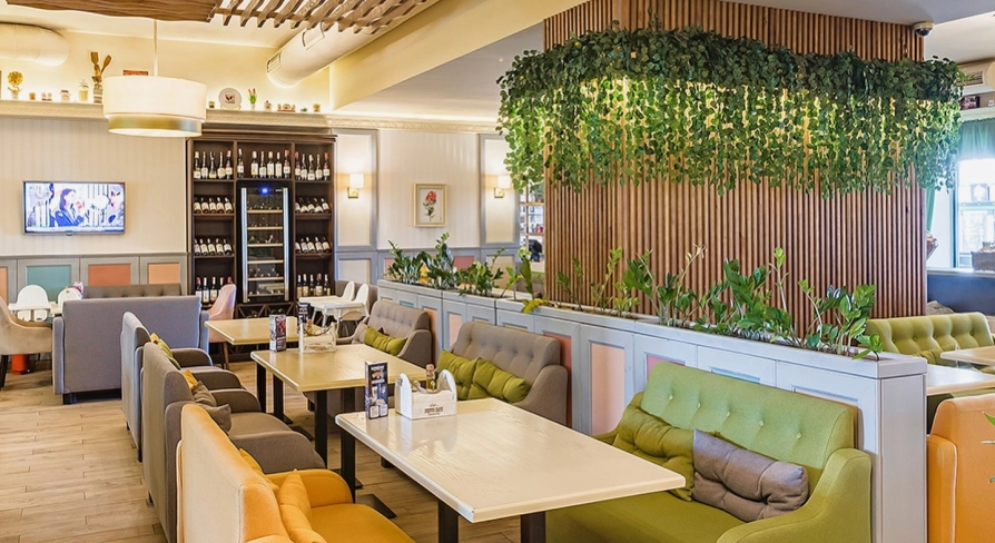 Cafe Pesto – a casual dining space with sofas and panoramic windows