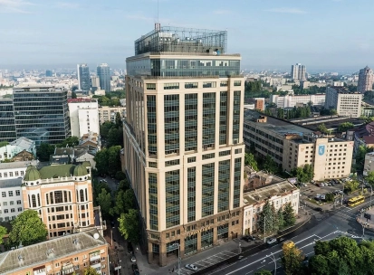 Senator Business Center in Kyiv - beige high-rise building facade with glass top