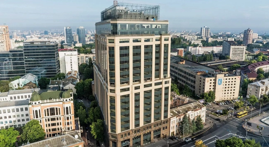 Senator Business Center in Kyiv - beige high-rise building facade with glass top