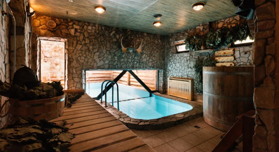 Banya with a pool and wooden tub at Sobi Club