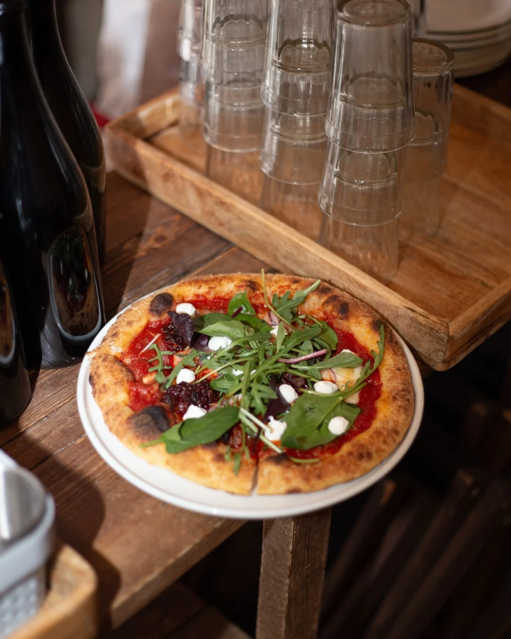 Pizza with greens and cheese at Autostation