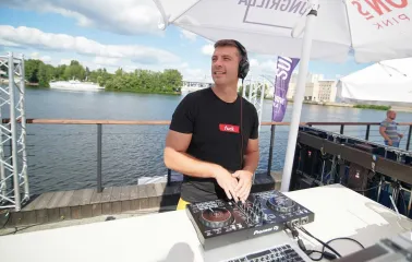 DJ at the mixing console during a party at Sungrilla Beach club