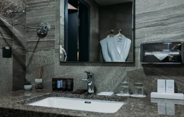 Favor Park Hotel - modern and clean bathroom interior with a big mirror