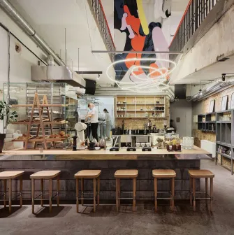 Octo Tower - modern interior of a cafe with a working kitchen