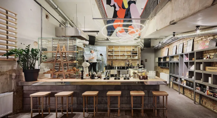 Octo Tower - modern interior of a cafe with a working kitchen