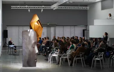 TSM m17 - large modern sculpture head placed near the building entrance