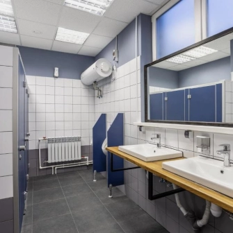 Kyiv Hostel - clean, shared bathroom with multiple wash basins and mirror