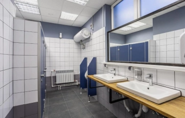 Kyiv Hostel - clean, shared bathroom with multiple wash basins and mirror