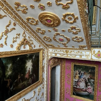 The “Versailles” Stairwell - ceiling adorned with gold moldings and classical paintings