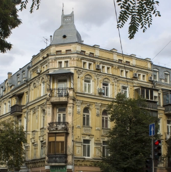 Verkhnii Val in Kyiv - historic building with an elegant facade and antique balconies