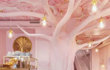 Interior of the Namelaka cafe in Kyiv with rosewood and a ceiling with petals