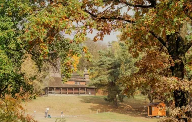 Pyrohiv Museum in Kyiv - hillside view of traditional buildings and trees