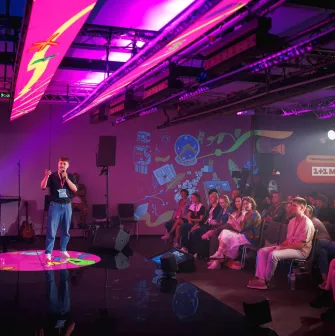 UNIT.City - conference setup with a stage and audience seating