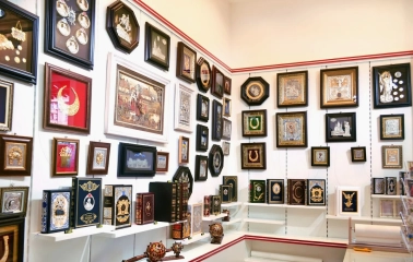 Folkmart in Kyiv - display of traditional Ukrainian souvenirs including religious icons and historical literature