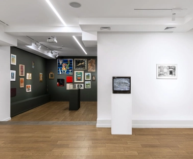 Wall with works of different genres at Voloshyn Gallery in Kyiv