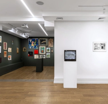 Wall with works of different genres at Voloshyn Gallery in Kyiv