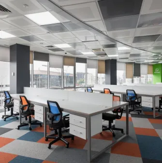 Peremoga Space - open-plan workspace with multiple desks and ergonomic chairs
