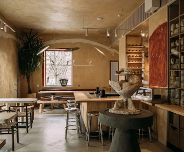 One Tea Tree - minimalist wooden interior with low seating, peaceful atmosphere