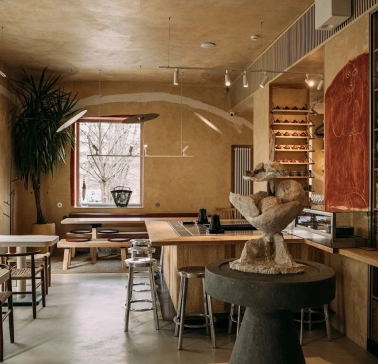 One Tea Tree - minimalist wooden interior with low seating, peaceful atmosphere