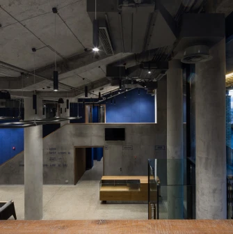 Teatr na Podoli in Kyiv - view from the theater interior looking out through large glass windows onto the evening street lights of Kyiv
