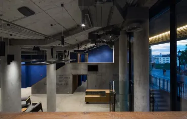 Teatr na Podoli in Kyiv - view from the theater interior looking out through large glass windows onto the evening street lights of Kyiv