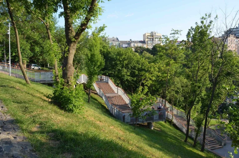 Green hills and wooden stairs at Landscape Alley in spring in Kyiv