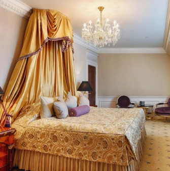 InterContinental - king-sized bed in a premium hotel room with lavish linens