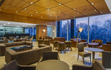 Lounge area with panoramic windows in CEC “Parkovy” in Kyiv
