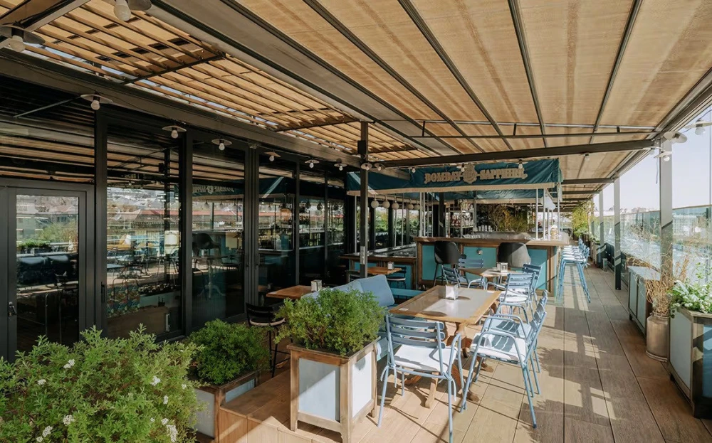 Summer terrace of Milk Bar TSUM restaurant in the center of Kyiv