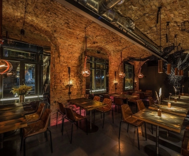 Winbar - view of the bar counter area with shelves filled with bottles and wine glasses